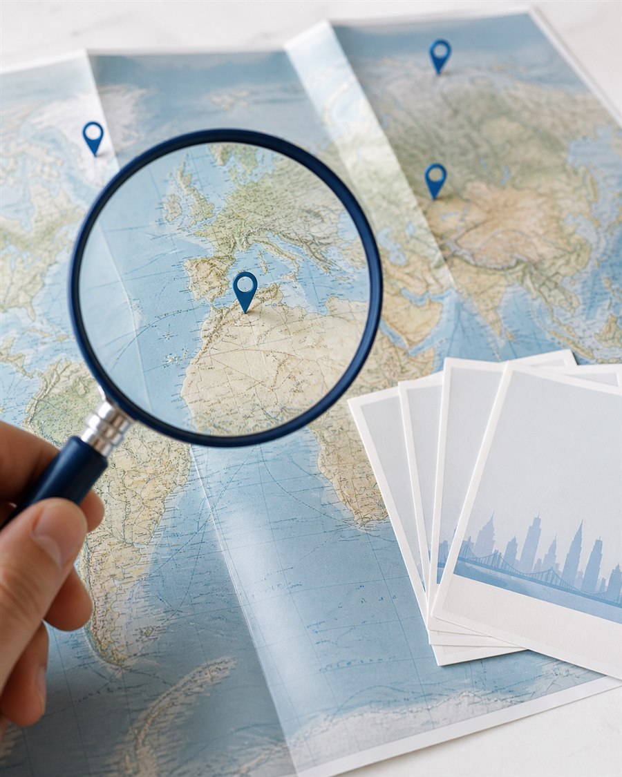 A world map being searched for more cities and routes